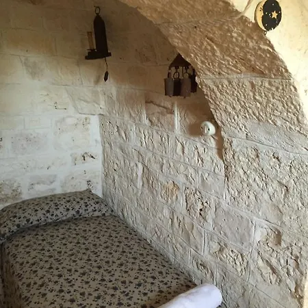 Trullo L'ulivo بيت للعطل